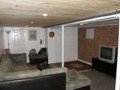Finished room with carpet and furniture