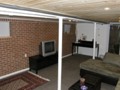 Finished room with carpet and furniture